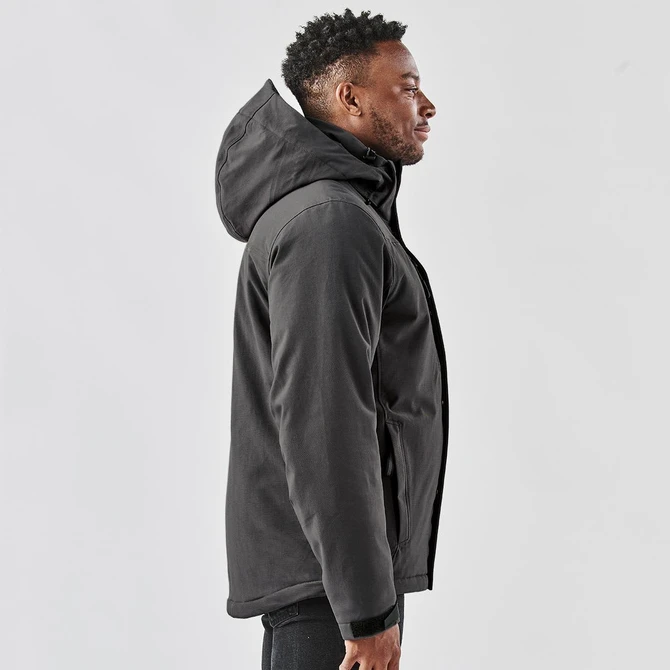 A men's thermal jacket in black featuring a hood, displayed on a model from the side. Includes a logo.