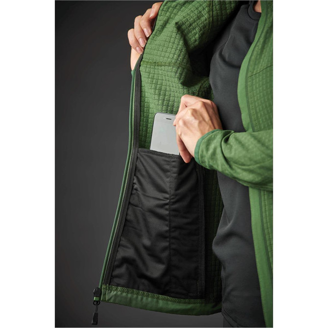 A green women's jacket with a pocket visible inside, holding a smartphone. The jacket features a textured design.