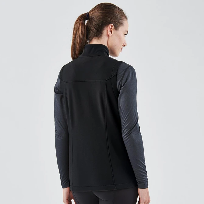 A black women's softshell vest with a high collar, featuring a fitted design and long sleeves.