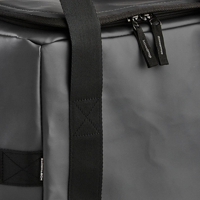 A grey cooler bag featuring a zippered closure, durable straps, and a branding label.