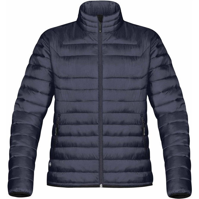 A women's puffy jacket in navy blue with a high collar and zippered pockets, featuring a logo on the side.