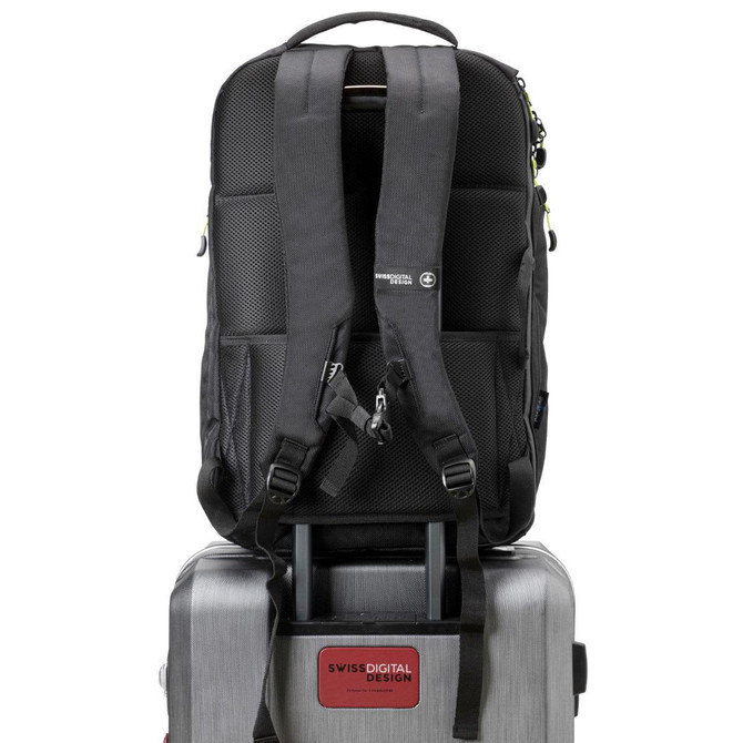 A black Swissdigital Java Backpack rests on a silver suitcase, featuring padded straps and a logo.