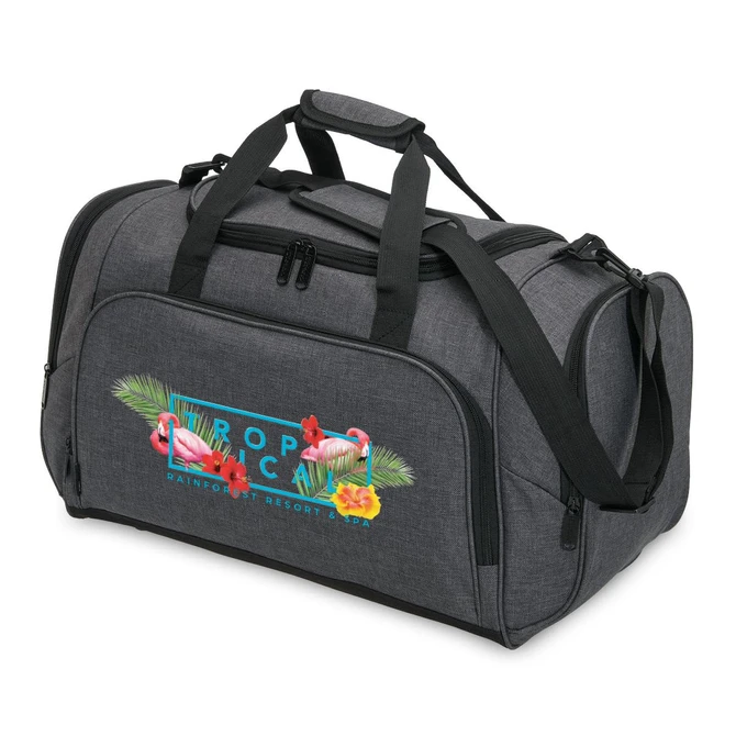 A grey duffle bag with a graphic design featuring tropical elements and a logo. It has dual handles and a shoulder strap.