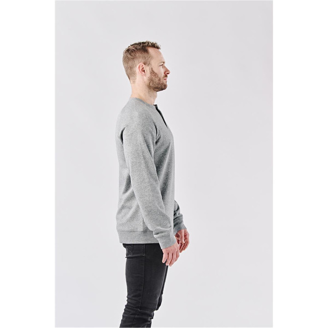 A men's grey Monashee Henley shirt shown from the side, featuring a round neckline and long sleeves.