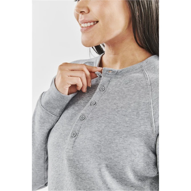 A grey women's henley shirt with a button placket, featuring a relaxed fit and a soft fabric texture.