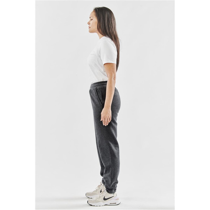 A side view of women's grey fleece jogger pants, featuring a relaxed fit and an elastic waistband.