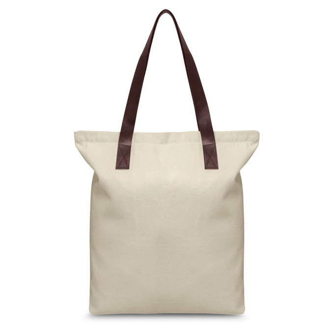 A cream tote bag with brown leather handles and a logo on the front.