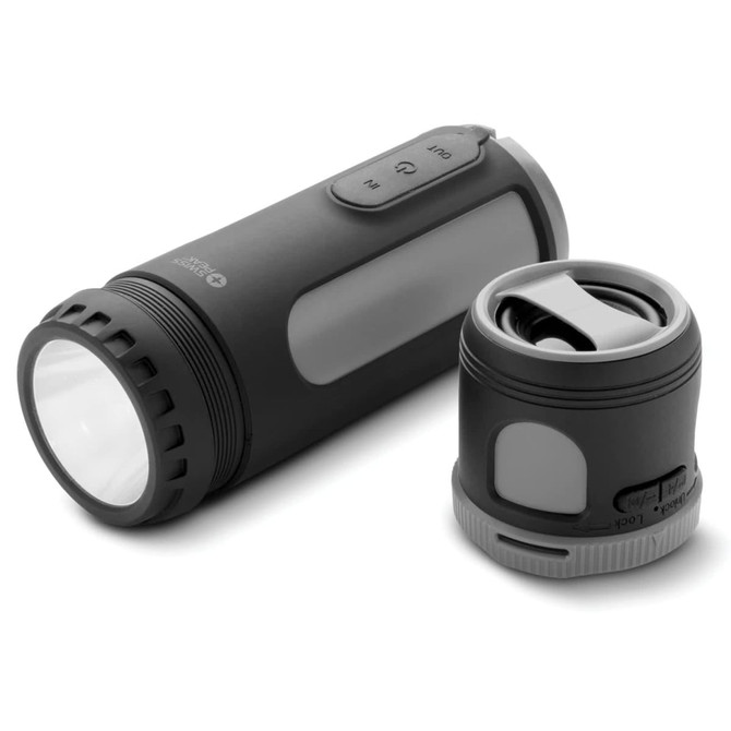 A black Swiss Peak 4-in-1 speaker with a detachable compartment, features controls on the side, and a branded logo.