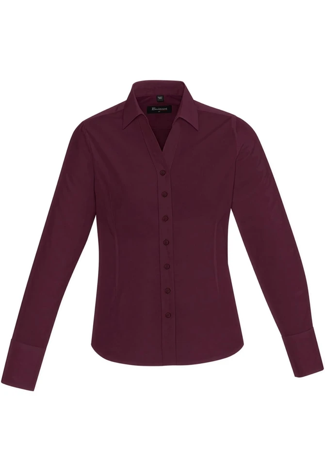 A burgundy long sleeve button-up shirt for women, featuring a classic collar and button closure. It has a logo.