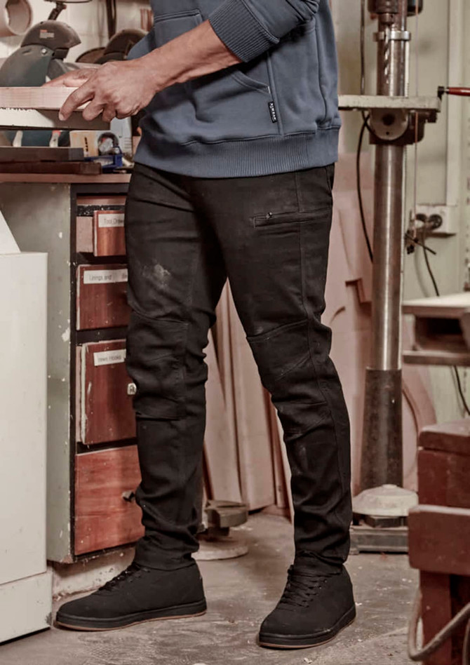 Mens Streetworx Stretch Jean in black, featuring a slim fit design, worn with a blue sweatshirt and black shoes.
