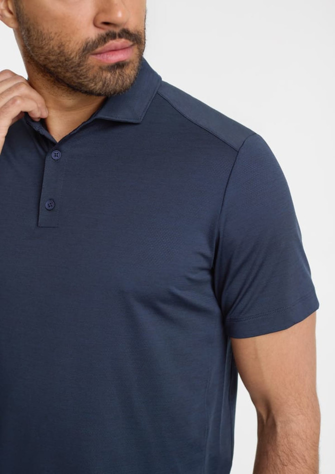A navy blue short sleeve polo shirt for men, featuring a collar and a logo on the chest.