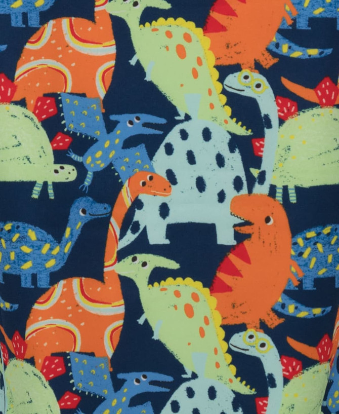 A printed scrub top featuring a colourful dinosaur pattern in shades of blue, orange, green, and yellow.