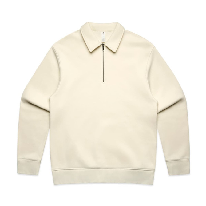 A cream-coloured collared crew jumper featuring a half-zip, with a simple design and a branding logo.