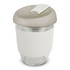 A drink bottle featuring a clear body with a beige, textured lid and a white silicone sleeve.