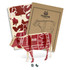 A wooden model of a cow in brown and cream, featuring labelled cuts of meat, with packaging behind it.