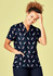 A navy V-neck scrub top featuring a playful Easter-themed pattern, with short sleeves and a pocket.