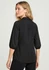 A black women's blouse with 3/4 sleeves, featuring a fitted design and a back pleat. It includes a logo.