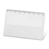 A card magnifier with a ruler along the top edge and a clear, smooth surface.