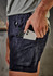 Men's rugged cooling stretch shorts in dark navy with a phone pocket, featuring a logo.