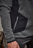 A grey and black unisex pullover featuring a zippered pocket and a logo on the sleeve.
