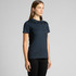 A navy blue polo shirt with a collar, featuring a logo, displayed on a model.