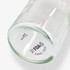 A glass drink bottle with a transparent finish, featuring a branding logo and a 750ml capacity.