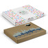A white die cut box with colourful confetti pattern on top and a brown box featuring a city skyline design.