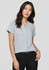 A light blue women's short sleeve button-up shirt displayed on a model, featuring a v-neckline and rolled sleeves.