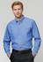 A blue chambray long sleeve shirt with button-up front and two chest pockets, featuring a branded logo.