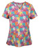 A printed scrub top featuring a vibrant pattern of colourful cats in shades of pink, purple, orange, and yellow.