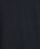 A dark black polo shirt featuring a textured fabric and a logo. Suitable for casual or sporty settings.