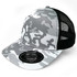 A grey and black camouflage trucker cap with a mesh backing and a branded logo patch.