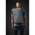A grey backpack with blue accents is worn on the back of a person. The backpack features a front zip pocket and has a logo.