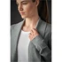 A grey women's cardigan features an open front and long sleeves, worn over a white top. The model has a neutral expression.