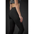 A model wearing black leggings from the Women's Pacifica collection, featuring a high waistband and a fitted design.
