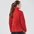 Red quilted jacket for women, featuring a high collar and a sleek design. Includes a branding logo.