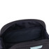A black toiletry bag with a zippered opening, featuring a mesh pocket inside for organisation.