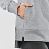 A grey women's cowl neck pullover featuring a side slit and a pocket at the hip, with a small logo tag.
