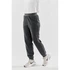 A pair of women's grey fleece jogger pants with an elastic waistband and side pockets. Contains branding.