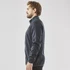 A men's full zip fleece jacket in dark navy, featuring a high collar and side pockets. It has a simple logo design.