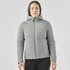 A woman is wearing a grey puffer jacket with a hood. The jacket has a fitted design and features a logo.