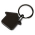 A house-shaped key ring in black, featuring a circular metal keychain. It has a sleek and simple design.