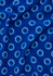 A blue tunic fabric featuring a white daisy print pattern. The material appears smooth and has a draping quality.