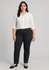 A model wears navy slim leg stretch chino pants paired with a white button-up shirt and black flats.