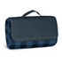 A folded picnic blanket in dark blue and navy check pattern, secured with a handle. It features a logo on the side.