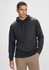A black hoodie featuring a front pocket and a drawstring hood, displayed on a model. It includes a logo.
