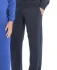 Track pants in navy, featuring a relaxed fit and side pockets, displayed alongside a blue top. Includes branding.