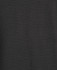 A black polo shirt made from popcorn cotton fabric, featuring a logo on the design.