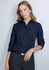 A navy blue women's 3/4 sleeve shirt, featuring a collared neckline and button front, worn by a model.