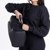 woman wearing ACHRO™ 22L EDC Backpack - SLICK black